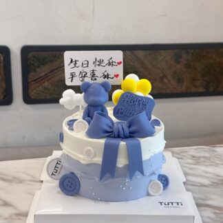 蓝色蝴蝶结男宝蛋糕